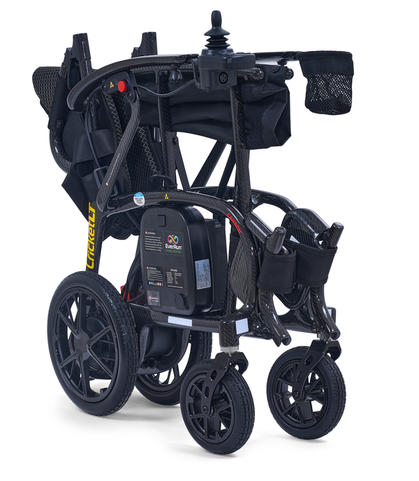 A Cricket power wheelchair shown in its folded position.
